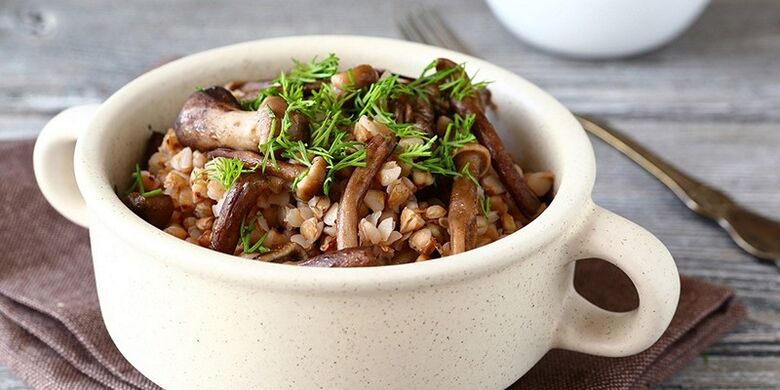Buckwheat porridge with mushrooms for lunch in a healthy diet menu