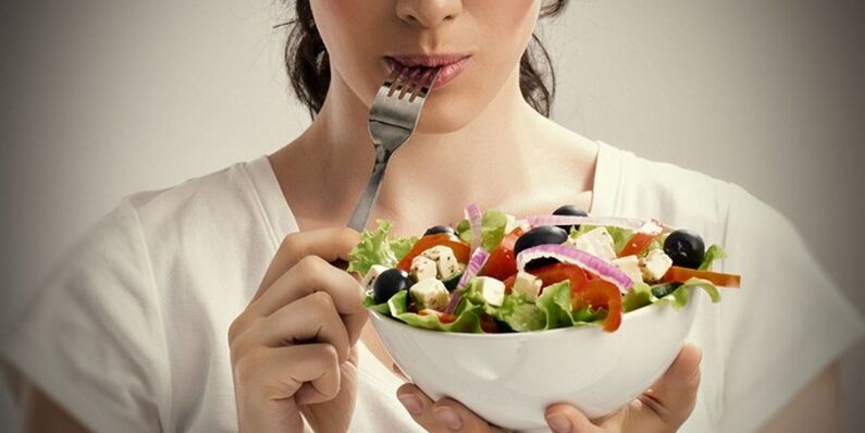 The girl eats properly to avoid problems with excess weight